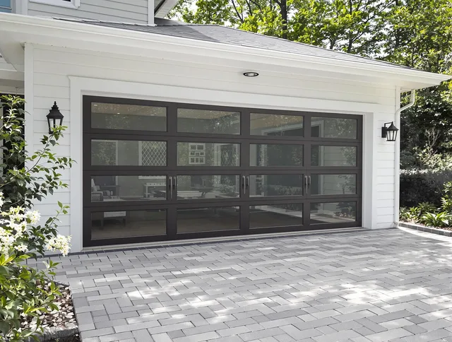New Fairfield Garage Door Repair design specialist presenting custom garage door options to New Fairfield homeowner