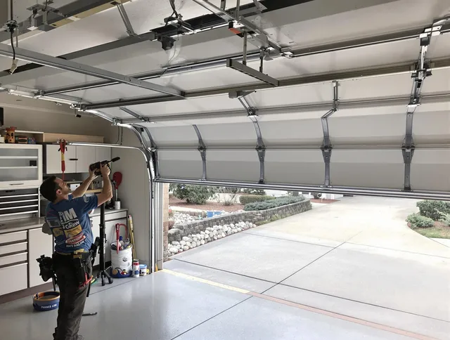 Garage door track repair service by New Fairfield Garage Door Repair in New Fairfield